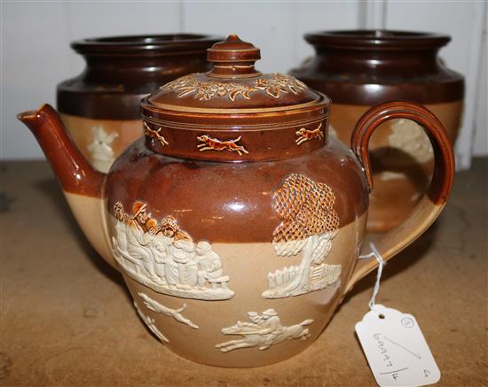 Pair of Royal Doulton stoneware tobacco jars (one lid a.f.) and a similar Doulton Lambeth teapot(-)